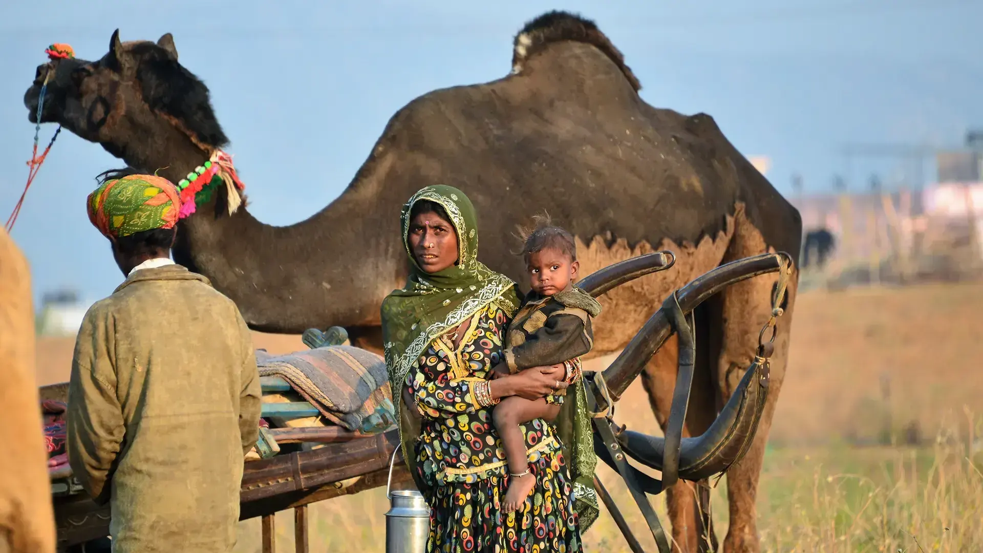 Farmer Family with Camel